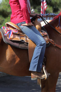 As the stirrup bar acts like a swing, gravity determines where the lower leg will go.